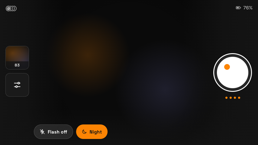 Camera capture screen: a blurred live preview with a large white shutter button on the right and Flash off / Night toggles.