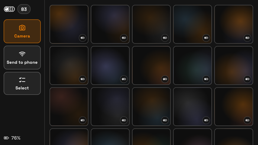 On-camera library in daylight mode: a grid of wigglegram thumbnails with Camera, Send to phone and Select in a left rail.